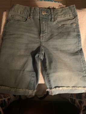 Calvin Klein Light Blue Denim Shorts with Frayed Hem
